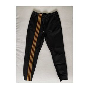 IVY PARK x ADIDAS (black & gold) Jogger pants